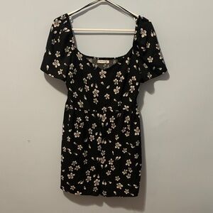 Ricky‘s black floral romper size 6